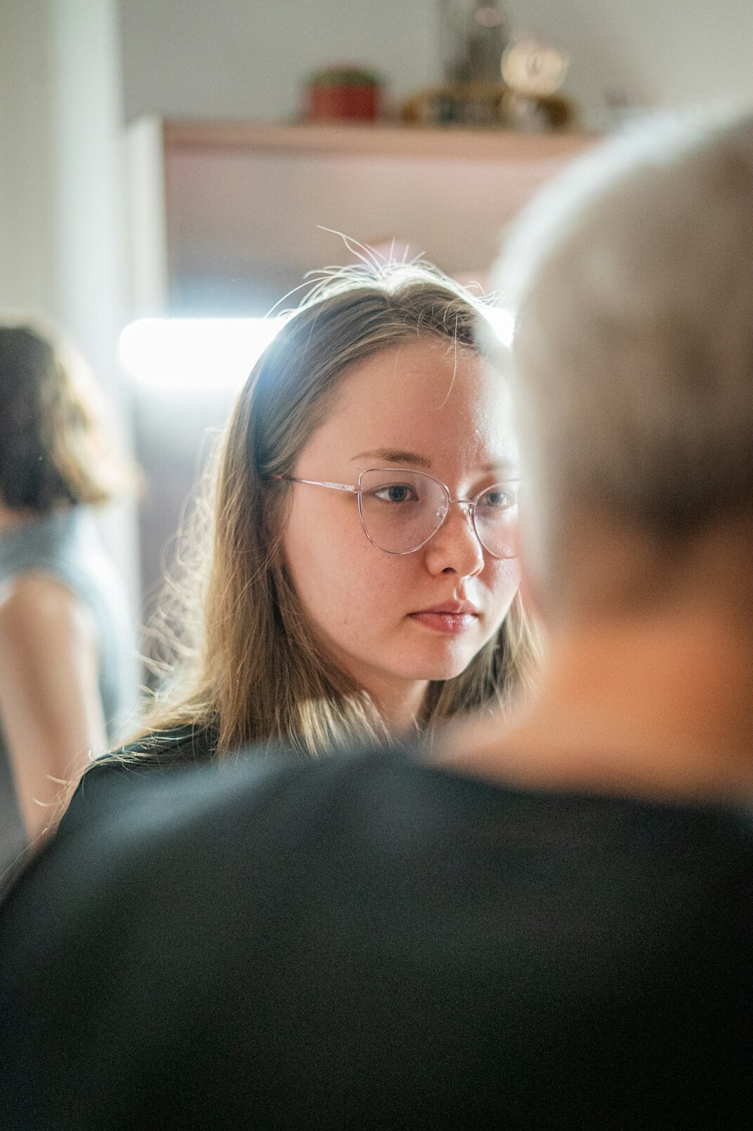 person listening attentively in conversation